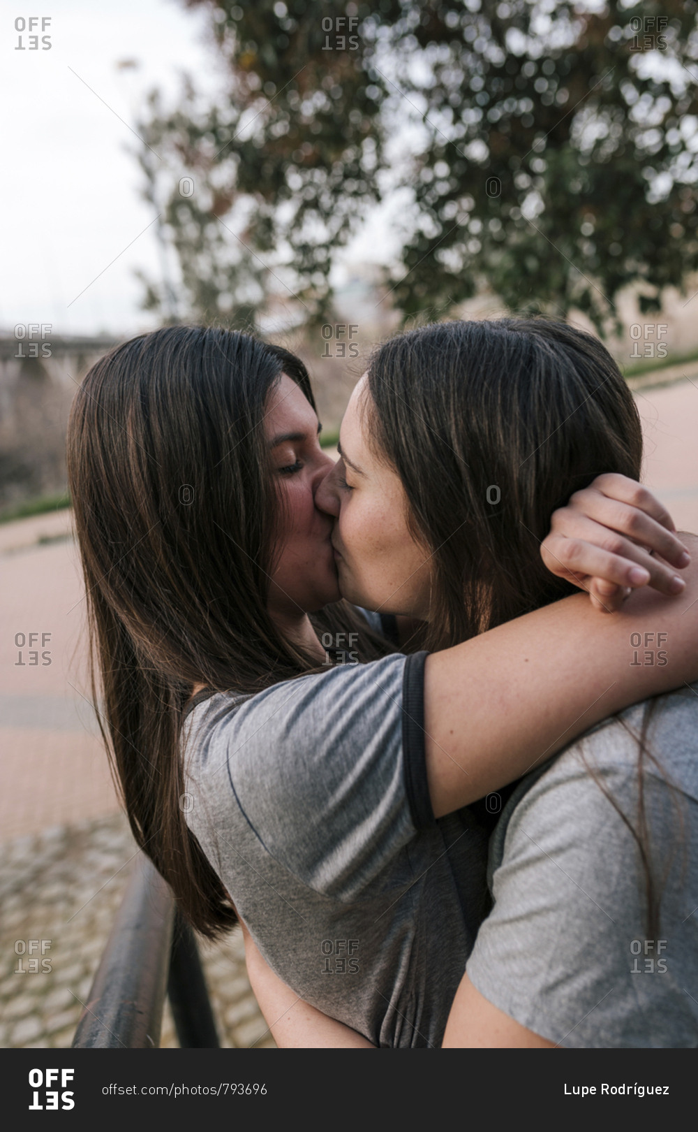 Lesbians Kissing On Bed