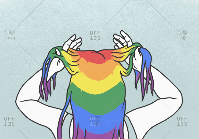 Woman with hands in rainbow hair