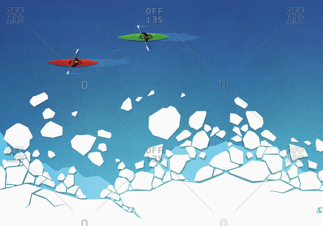 View from above people kayaking along ice on ocean