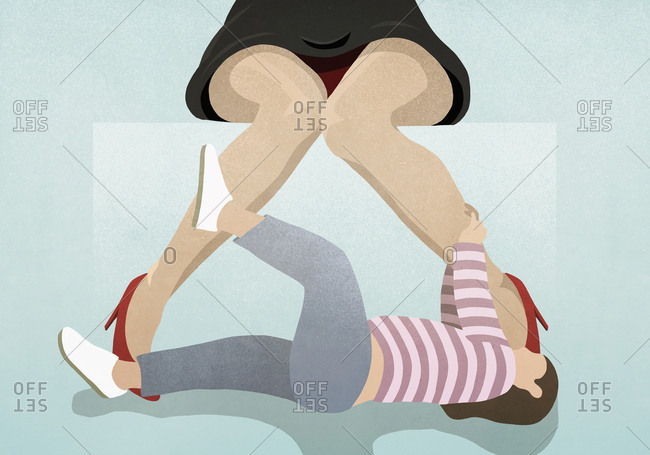 Playful child pulling at mothers legs