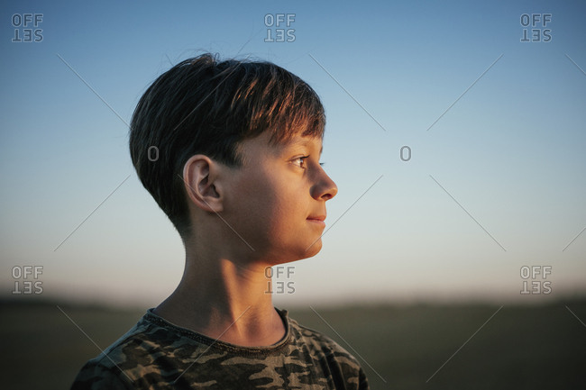 Thoughtful boy looking away