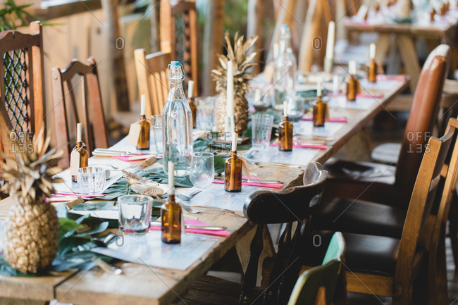 Wedding reception table with gold pineapples