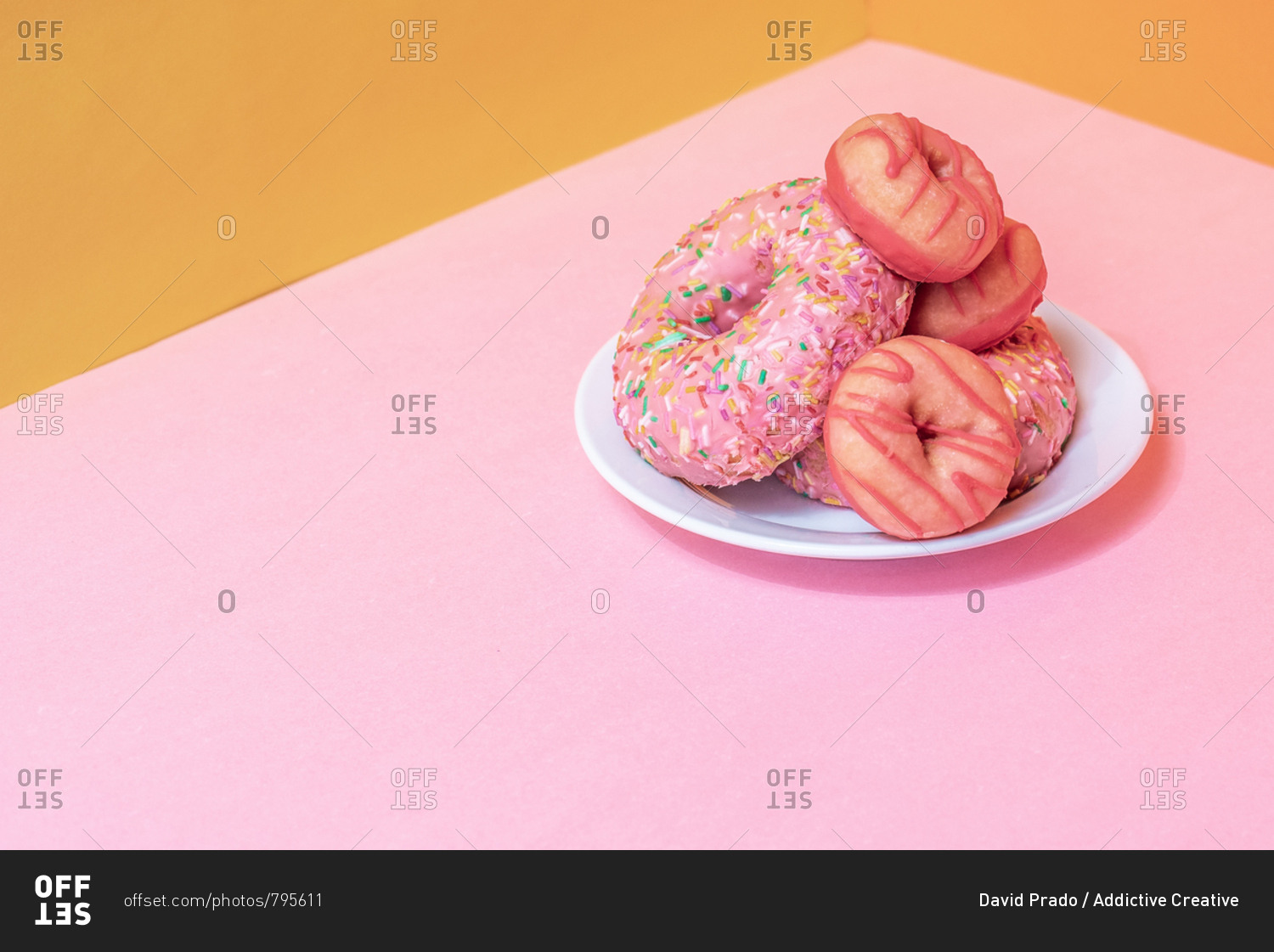 Pink doughnuts in a colorful background