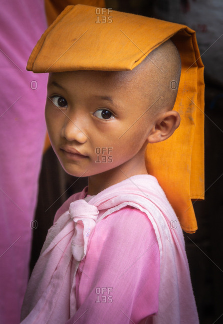 Mandalay, Myanmar - June, 25 2012: Monk boys in monastery yard