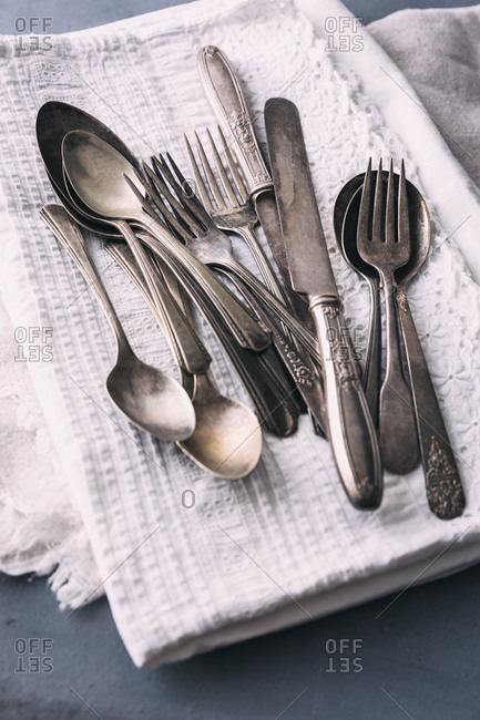 Vintage flatware on antique linen