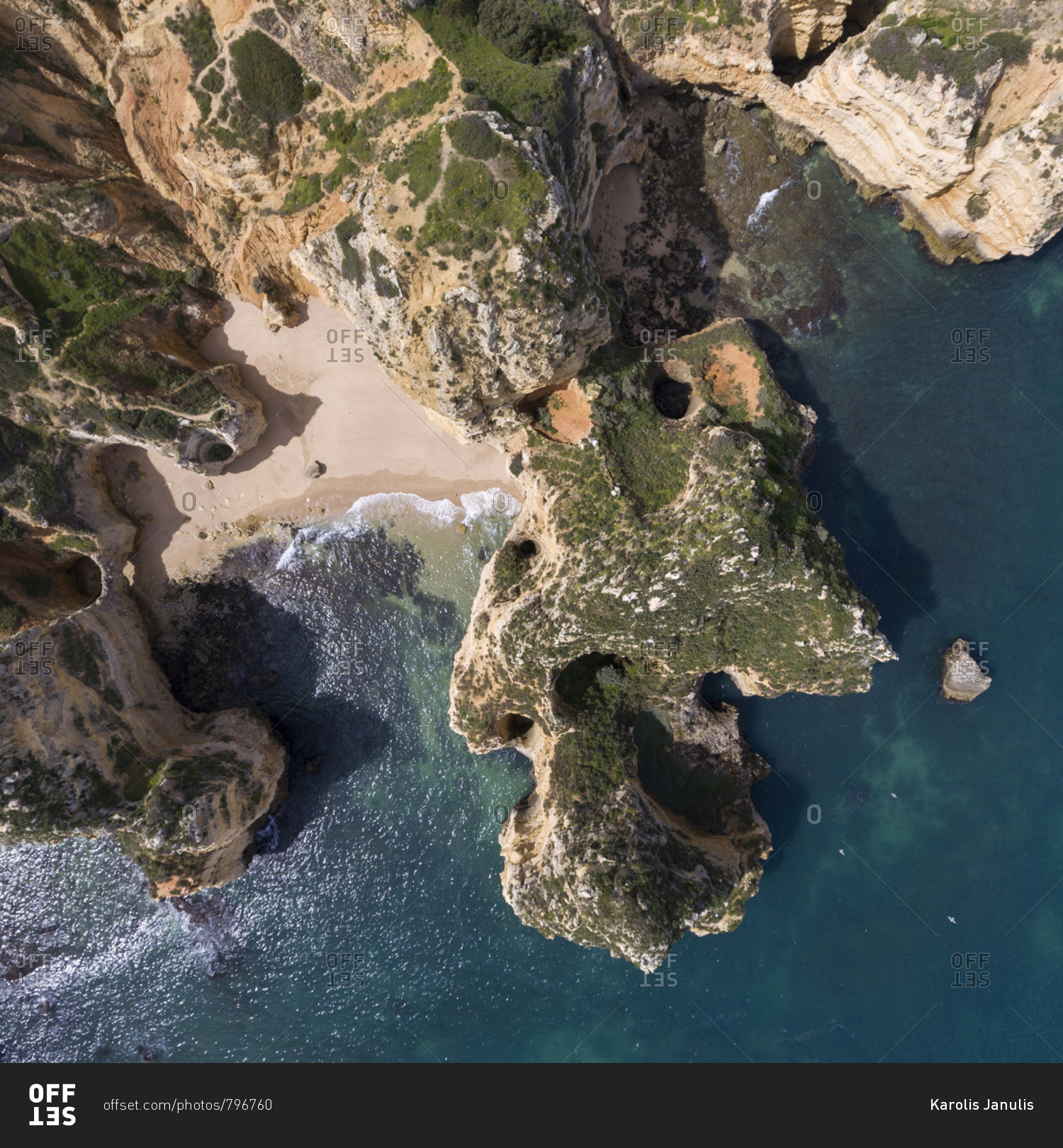 Rocky coastline by the ocean from above