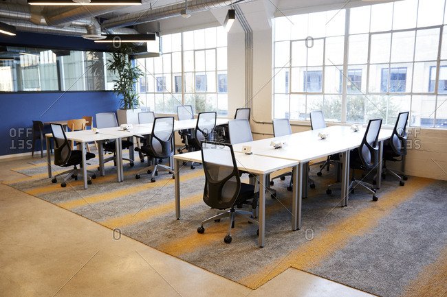 Open plan desk workspace in a creative office