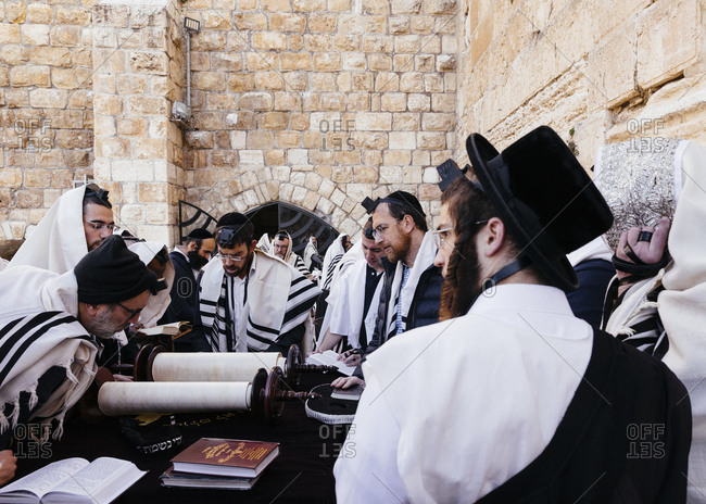 January 21, 2019: Orthodox Jewish men praying at the wailing wall known also as the western wall in the old city, Jerusalem, Israel.