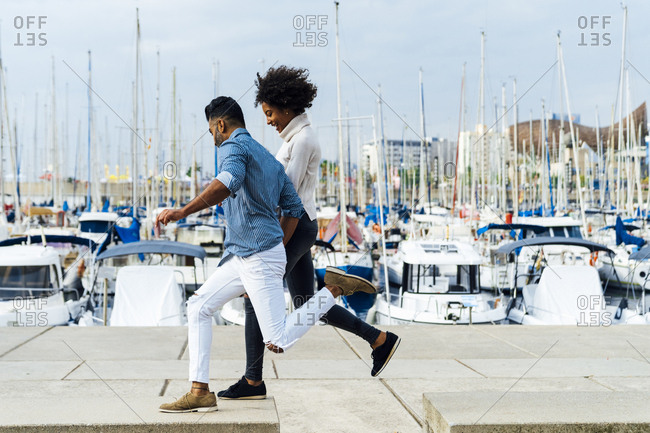 Spain- Barcelona- happy couple having fun at the marina