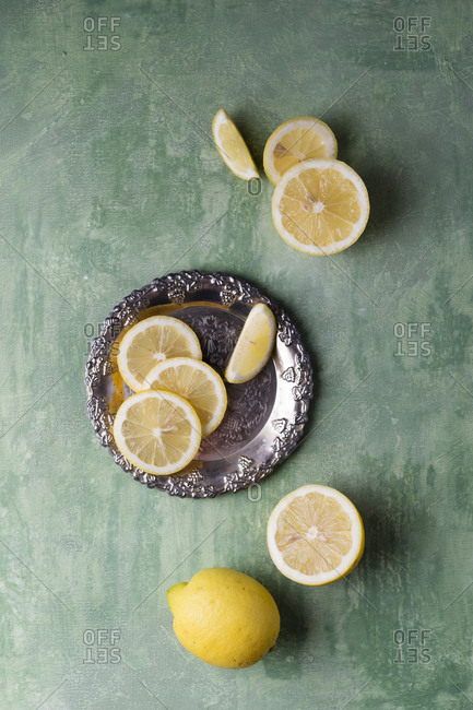 Lemon slices on silver plate