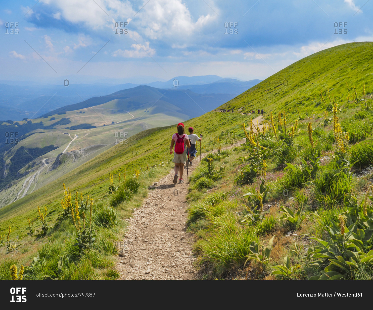 Italy- Umbria- Sibillini mountains- two children hiking mount Vettore