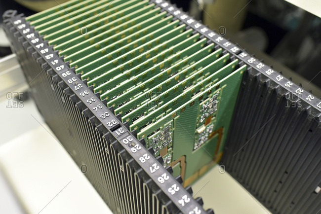 Close-up of circuit boards in an electronics factory