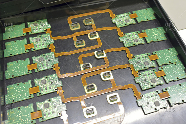 Close-up of circuit boards in an electronics factory