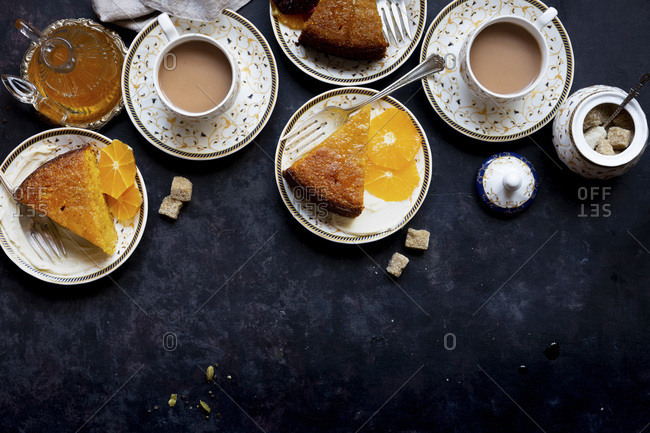 Whole orange olive oil cake with almond and cornmeal, finished with cardamom orange syrup - Gluten-free.