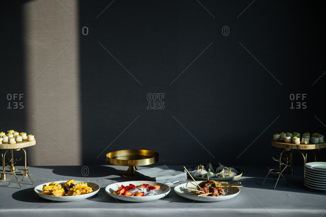 Gourmet appetizers and dessert served on a table