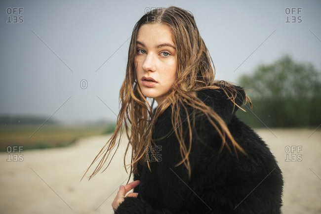 Close up of a woman in a fur coat