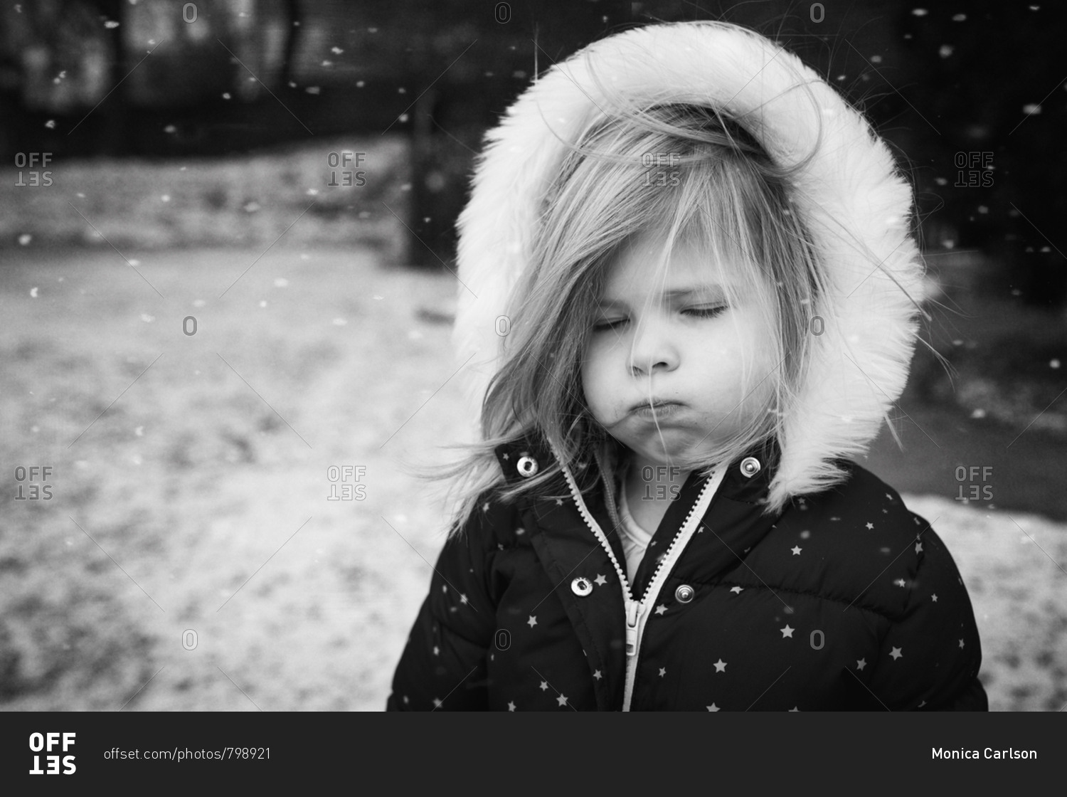 Little girl that does not like snow