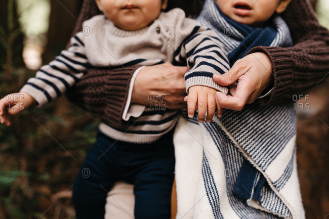 Grandma holds grandchildren