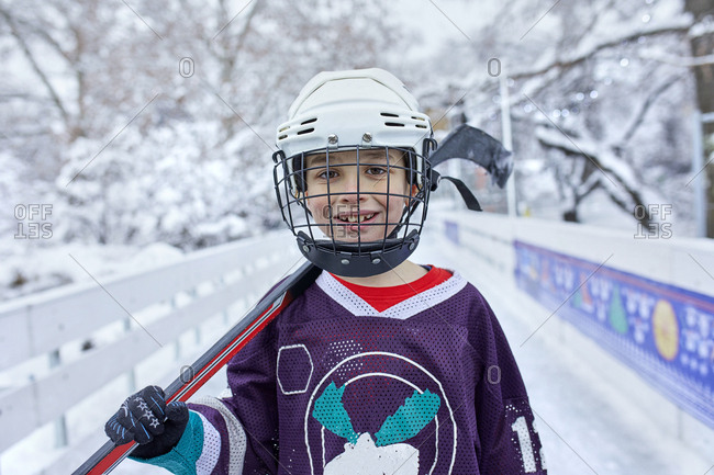 Portrait of a boy in ice hockey gear