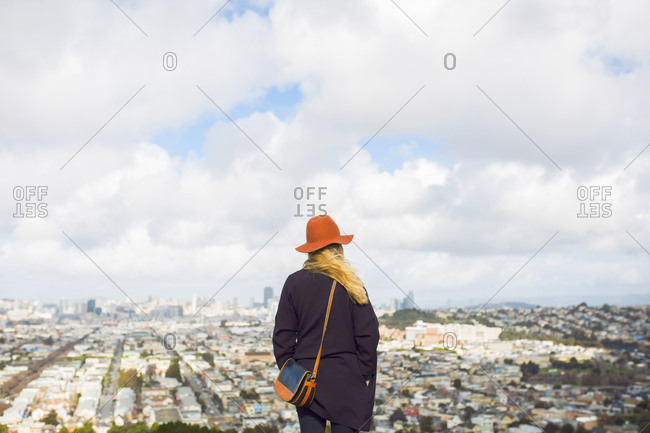 Rear view of woman looking at city