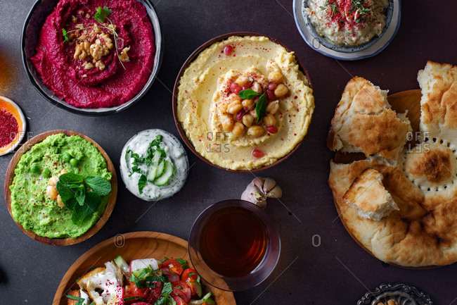 Israeli cuisine: hummus variety, fattoush, baba ganoush, flat bread