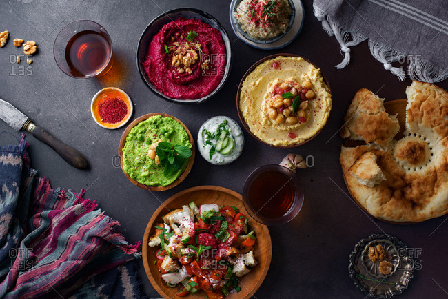 Israeli cuisine: hummus variety, fattoush, baba ganoush, flat bread