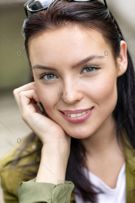 Portrait of a young woman- with sunglasses in her hair