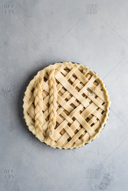 Raw pie in tin ready to be baked.
