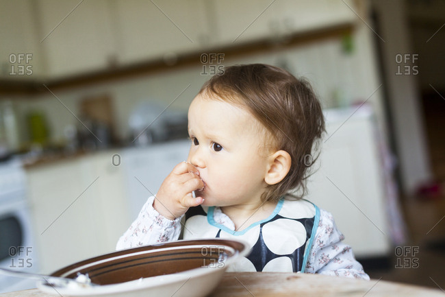 Baby girl looking away