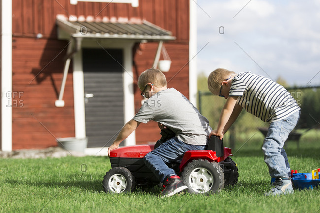 Boys playing in backyard