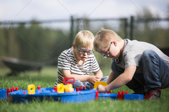 Boys playing in backyard
