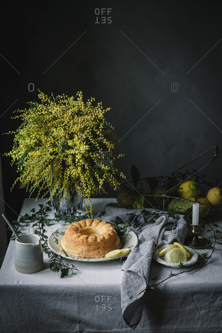 Bundt cake cut into pieces on table