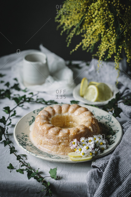 Bundt cake cut into pieces on table