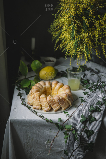 Bundt cake cut into pieces on table
