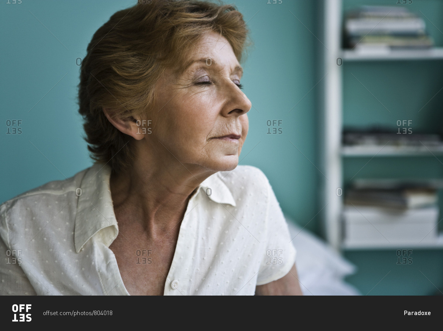 Senior woman with eyes closed