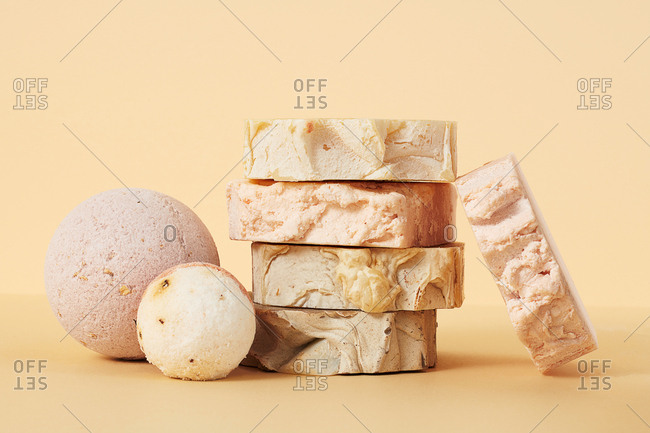 Still life of natural hand made soap and bath bombs on neutral background