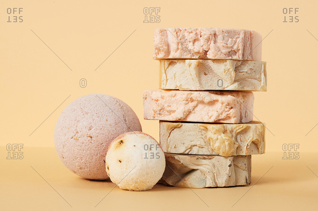 Still life of natural hand made soap and bath bombs on neutral background