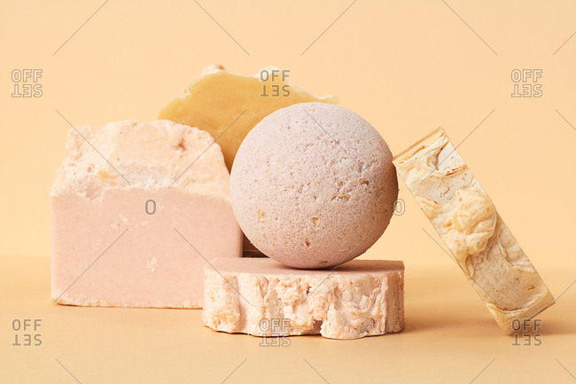 Still life of natural hand made soap and bath bombs on neutral background