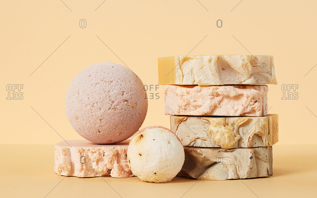 Still life of natural hand made soap and bath bombs on neutral background