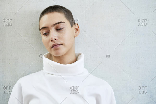 Portrait of thoughtful short-haired young woman