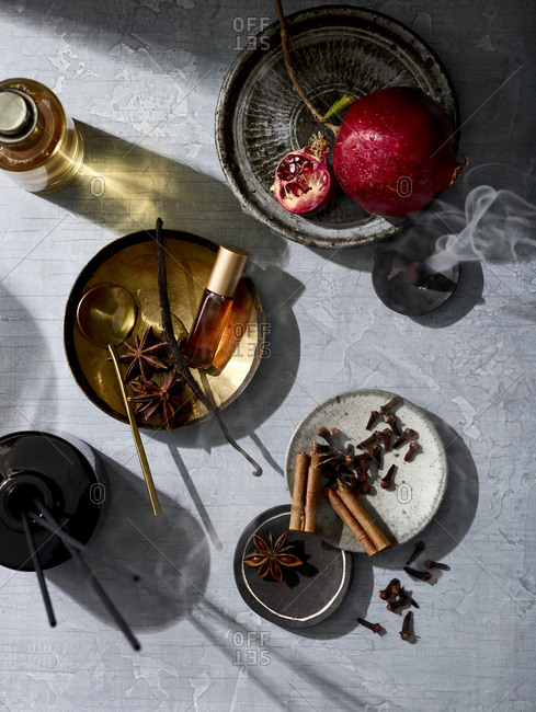 Pomegranate and cinnamon set with essential oils and smokey incense.