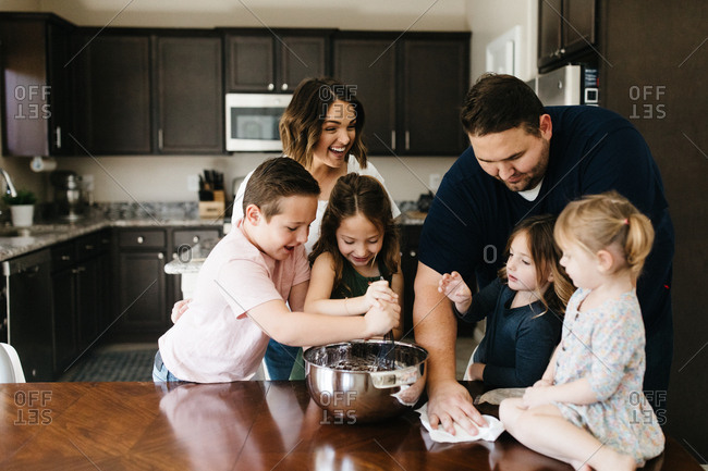 Kids mixing brownies and baking