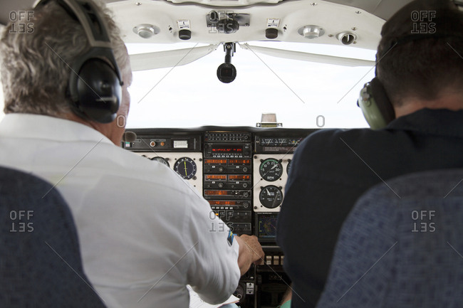 October 30, 2011: EXUMA, Bahamas. A view of the cockpit on the flight back to Nassau from the Exuma Islands.
