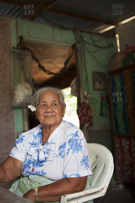 April 9, 2010: FRENCH POLYNESIA, Tahaa Island. A grandmother sitting in her kitchen.