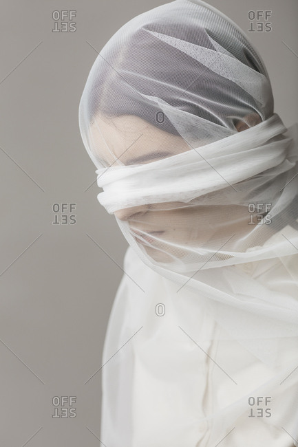 Blindfold woman- wrapped in a veil