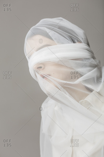 Blindfold woman- wrapped in a veil