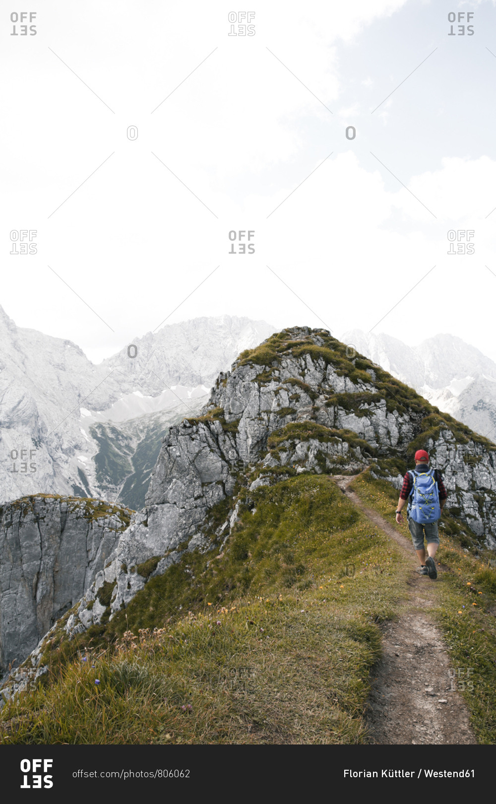 Austria- Tyrol- man hiking on mountain trail