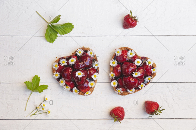 Homemade strawberry heart cakes with daisy flowers- edible flowers
