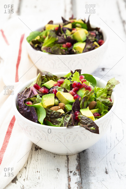 Detox salad bowl with avocado- pomegranate seeds- roasted soybeans- sunflower seeds and nuts