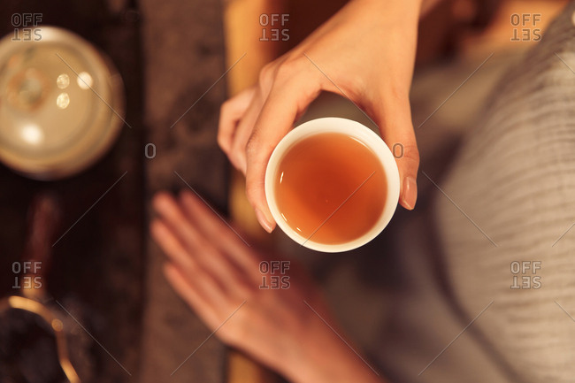Young women drinking tea